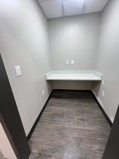 Same alcove after the final clean, with a clean floor and counter