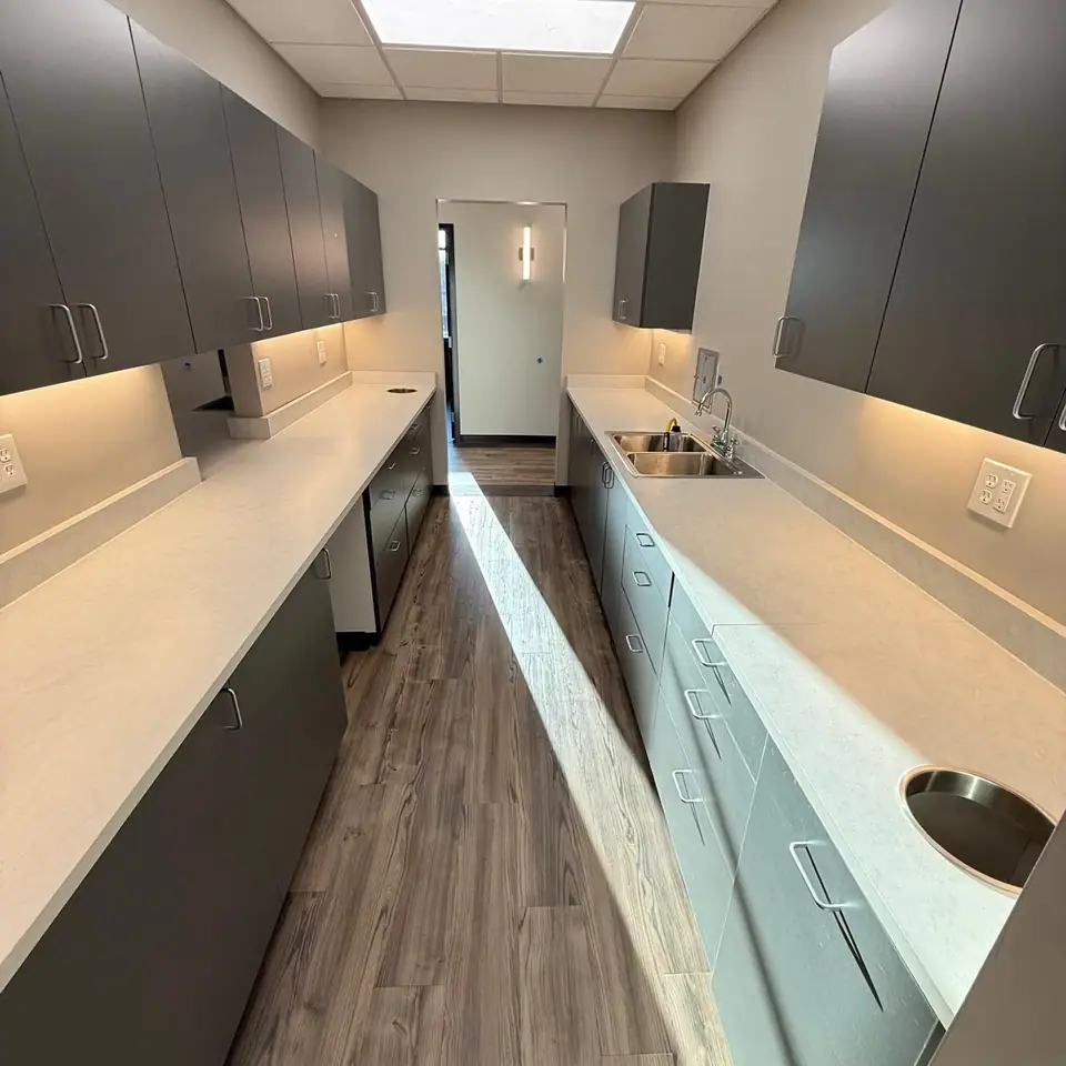 Clean countertops and cabinets after construction cleanup