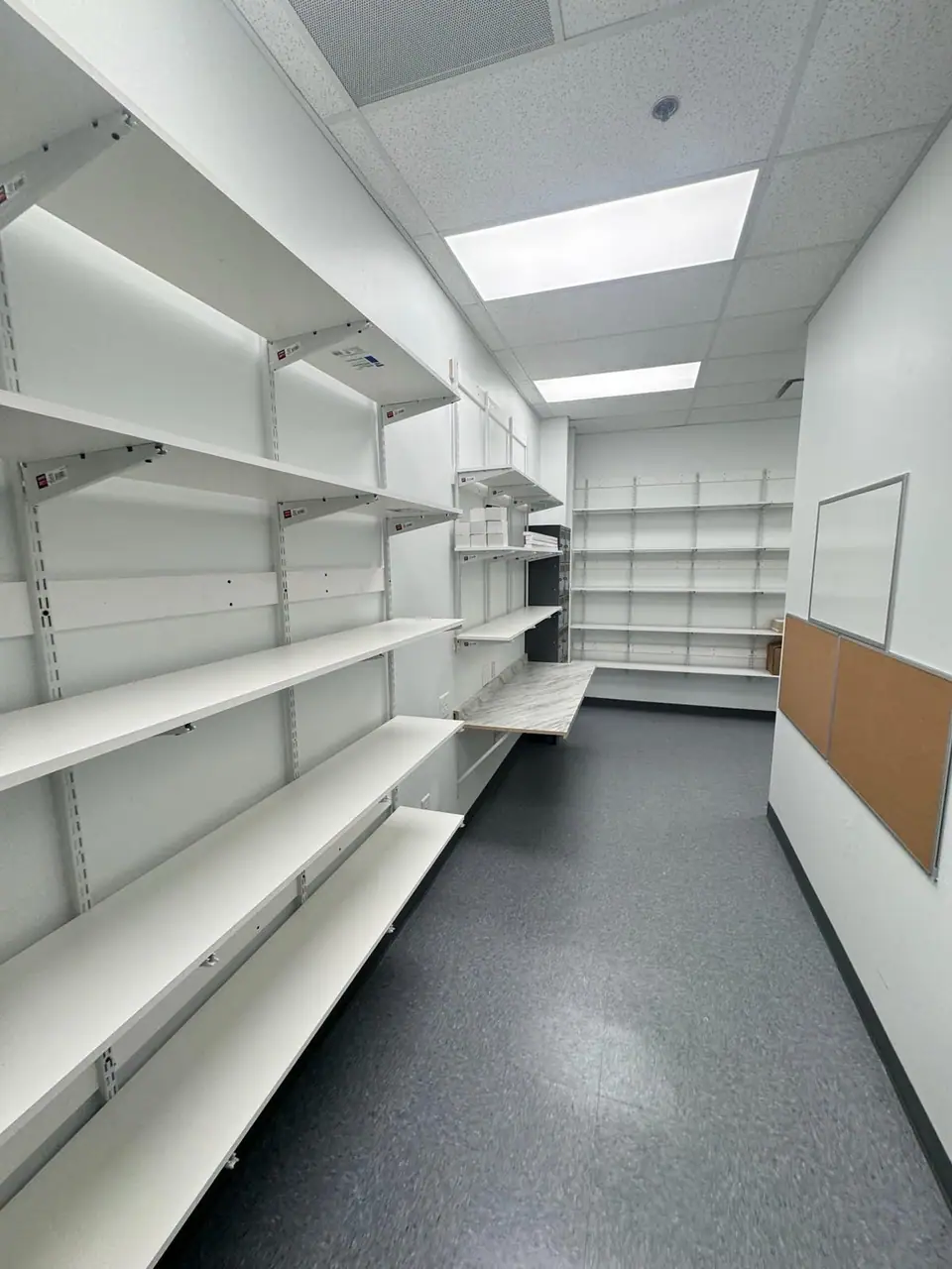 Storage room shelving cleaned after build-out