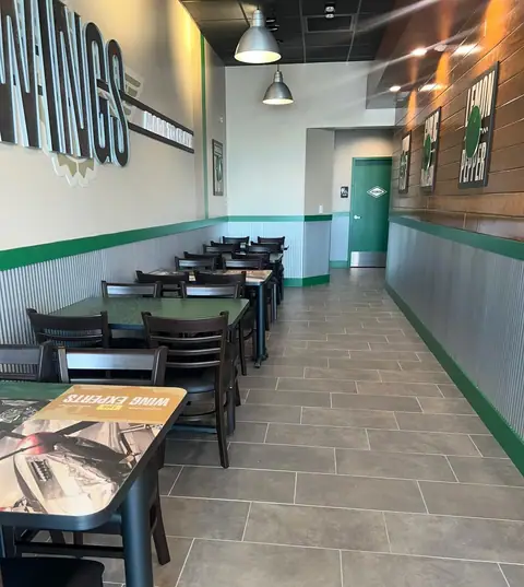 Wingstop restaurant dining area after final clean